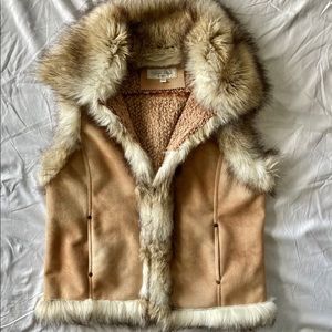 Micro suede vest with faux coyote fur trim